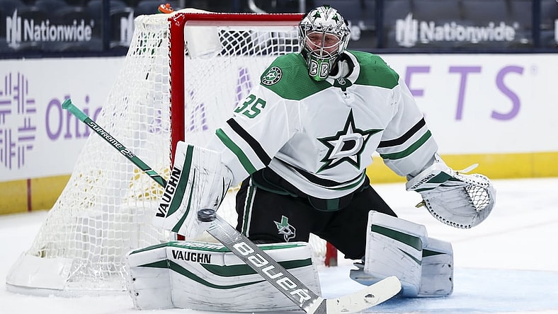 Feb 4, 2021; Columbus, Ohio, USA; Dallas Stars goaltender Anton Khudobin (35) makes a blocker save in net against the Columbus Blue Jackets in the first period at Nationwide Arena. Mandatory Credit: Aaron Doster-USA TODAY Sports