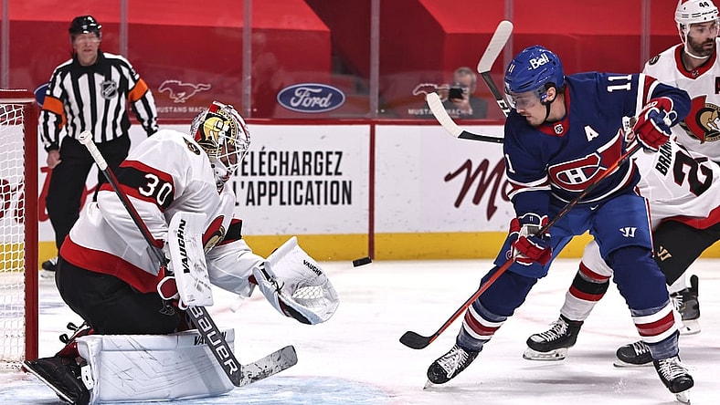 Feb 04, 2021; Montreal, Quebec, CAN; Ottawa Senators goaltender Matt Murray (30) makes a save against Montreal Canadiens right wing Brendan Gallagher (11) during the first period at Bell Centre. Mandatory Credit: Jean-Yves Ahern-USA TODAY Sports