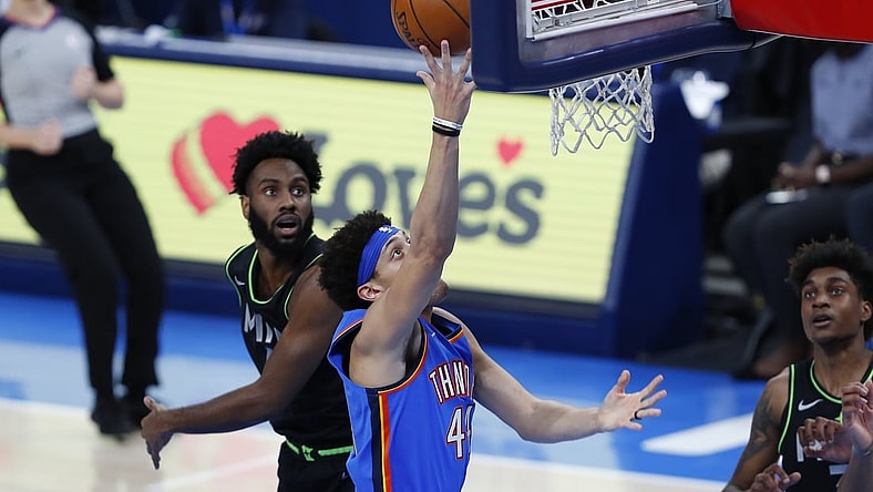 Feb 5, 2021; Oklahoma City, Oklahoma, USA; Oklahoma City Thunder forward Justin Jackson (44) goes to the basket ahead of Minnesota Timberwolves guard Jaylen Nowell (4) during the first half at Chesapeake Energy Arena. Mandatory Credit: Alonzo Adams-USA TODAY Sports