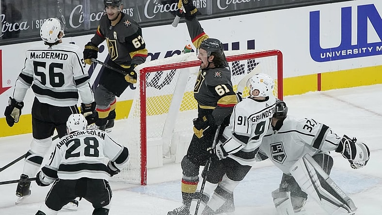 Feb 5, 2021; Las Vegas, Nevada, USA; Vegas Golden Knights right wing Mark Stone (61) celebrates after scoring against Los Angeles Kings goaltender Jonathan Quick (32) during the first period of an NHL hockey game Friday, Feb. 5, 2021, in Las Vegas at T-Mobile Arena. Mandatory Credit: John Locher/Pool Photo-USA TODAY Sports
