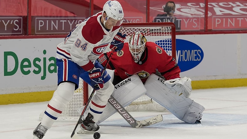 Feb 6, 2021; Ottawa, Ontario, CAN; Montreal Canadiens right wing Corey Perry (94) skates with the puck in front of  Ottawa Senators goalie Matt Murray (30) in the first period at the Canadian Tire Centre. Mandatory Credit: Marc DesRosiers-USA TODAY Sports