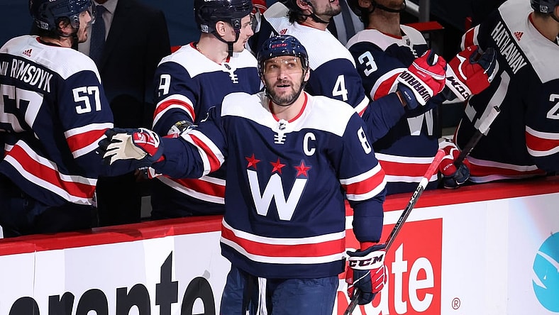 Feb 7, 2021; Washington, District of Columbia, USA; Washington Capitals left wing Alex Ovechkin (8) celebrates with teammates after scoring a goal against the Philadelphia Flyers in the second period at Capital One Arena. Mandatory Credit: Geoff Burke-USA TODAY Sports