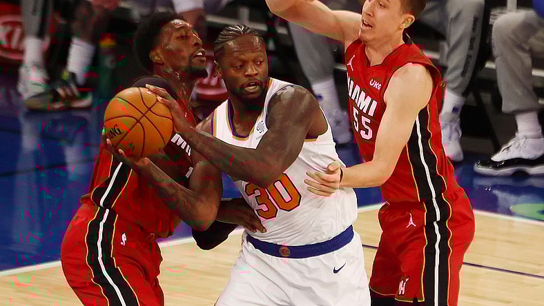 Feb 7, 2021; New York, New York, USA;   Duncan Robinson #55 and Bam Adebayo #13 of the Miami Heat defend against Julius Randle #30 of the New York Knicks at Madison Square Garden on February 07, 2021 in New York City. Mandatory Credit: Mike Stobe/Pool Photo-USA TODAY Sports