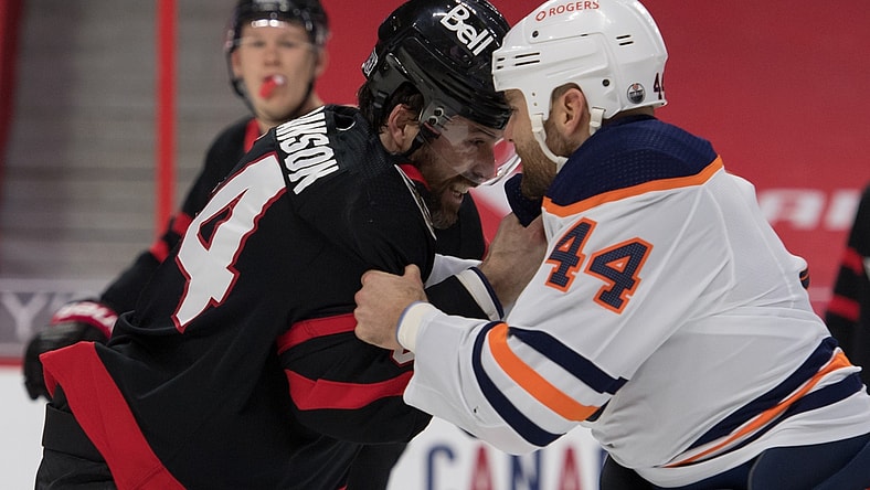 Feb 8, 2021; Ottawa, Ontario, CAN; Ottawa Senators defensman Erik Gudbranson (44) fights with Edmonton Oilers right wing Zack Kassian (44) in the first period at the Canadian Tire Centre. Mandatory Credit: Marc DesRosiers-USA TODAY Sports