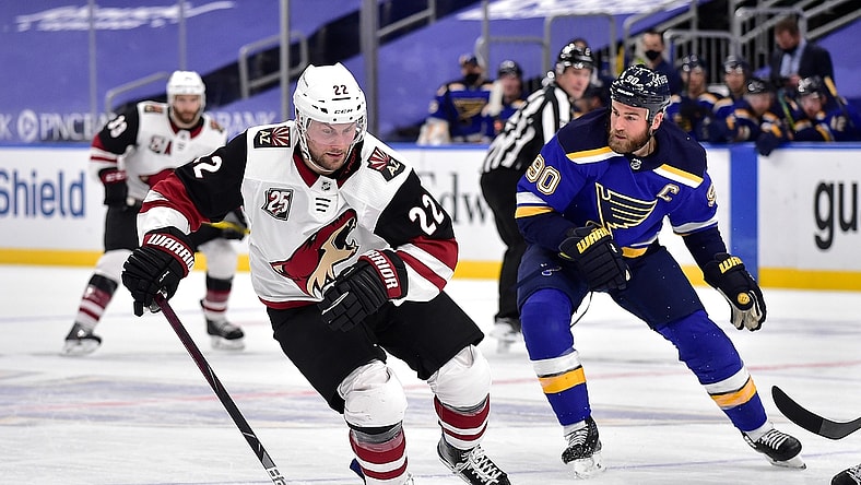 Feb 8, 2021; St. Louis, Missouri, USA;  Arizona Coyotes left wing Johan Larsson (22) handles the puck during the second period against the St. Louis Blues at Enterprise Center. Mandatory Credit: Jeff Curry-USA TODAY Sports