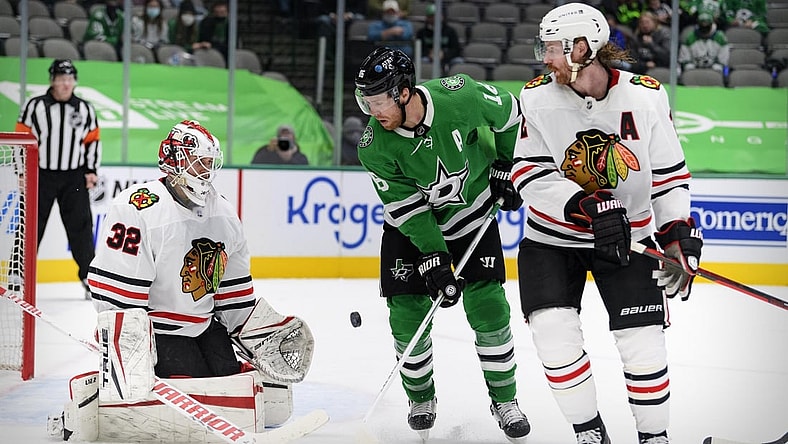 Feb 9, 2021; Dallas, Texas, USA; Chicago Blackhawks goaltender Kevin Lankinen (32) and defenseman Duncan Keith (2) defend against Dallas Stars center Joe Pavelski (16) during the second period at the American Airlines Center. Mandatory Credit: Jerome Miron-USA TODAY Sports