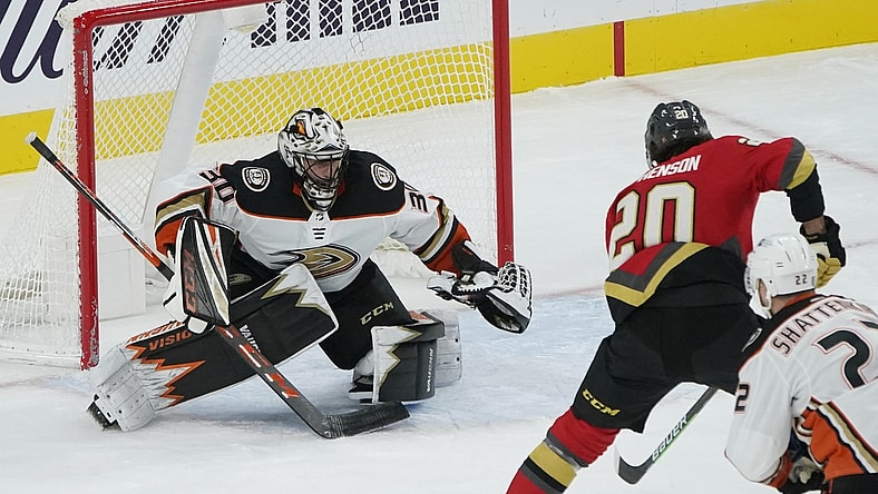 Feb 9, 2021; Las Vegas, Nevada, USA; Vegas Golden Knights center Chandler Stephenson (20) sets up a shot to score on Anaheim Ducks goaltender Ryan Miller (30) during the first period at T-Mobile Arena. Mandatory Credit: John Locher/Pool Photo-USA TODAY Sports