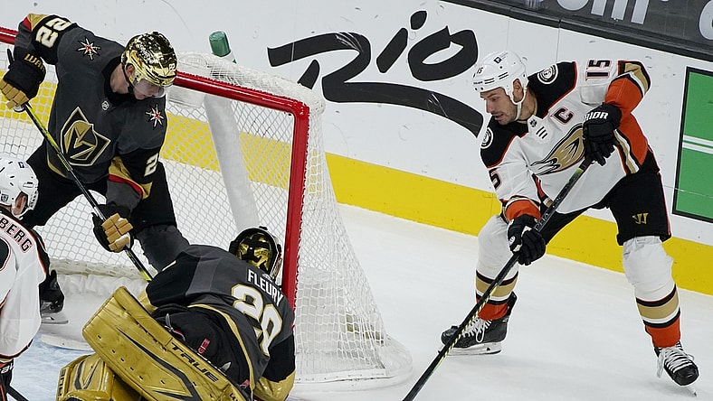 Feb 11, 2021; Las Vegas, Nevada, USA; Anaheim Ducks center Ryan Getzlaf (15) attempts a shot on Vegas Golden Knights goaltender Marc-Andre Fleury (29) during the first period at T-Mobile Arena. Mandatory Credit: John Locher/Pool Photos-USA TODAY Sports