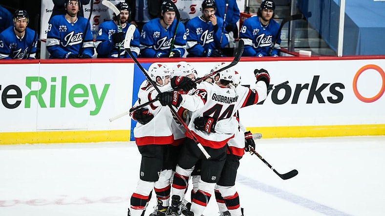 Feb 13, 2021; Winnipeg, Manitoba, CAN;  Ottawa Senators forward Brady Tkachuk (7) celebrates his goal scored against the Winnipeg Jets during the third period at Bell MTS Place. Mandatory Credit: Terrence Lee-USA TODAY Sports
