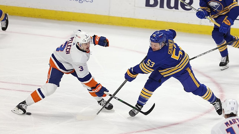 Feb 15, 2021; Buffalo, New York, USA;  New York Islanders defenseman Adam Pelech (3) blocks a shot on goal by Buffalo Sabres left wing Jeff Skinner (53) during the second period at KeyBank Center. Mandatory Credit: Timothy T. Ludwig-USA TODAY Sports