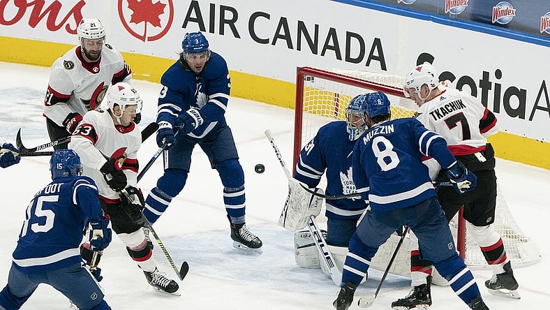 Feb 15, 2021; Toronto, Ontario, CAN; Ottawa Senators right wing Evgenii Dadonov (63) scores a goal against the Toronto Maple Leafs during the third period at Scotiabank Arena. Mandatory Credit: Nick Turchiaro-USA TODAY Sports