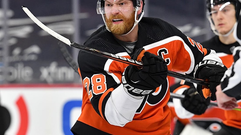 Feb 3, 2021; Philadelphia, Pennsylvania, USA; Philadelphia Flyers center Claude Giroux (28) against the Boston Bruins at Wells Fargo Center. Mandatory Credit: Eric Hartline-USA TODAY Sports