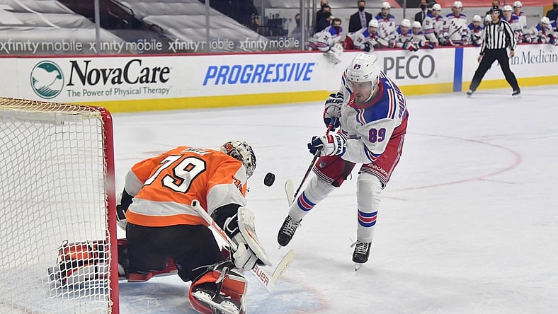 Feb 18, 2021; Philadelphia, Pennsylvania, USA; Philadelphia Flyers goaltender Carter Hart (79) makes a save against New York Rangers right wing Pavel Buchnevich (89) on a penalty shot during the second period at Wells Fargo Center. Mandatory Credit: Eric Hartline-USA TODAY Sports