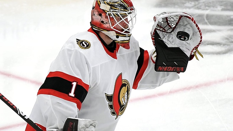 Feb 18, 2021; Toronto, Ontario, CAN;  Ottawa Senators goalie Marcus Hogberg (1) warms up before playing Toronto Maple Leafs at Scotiabank Arena. Mandatory Credit: Dan Hamilton-USA TODAY Sports
