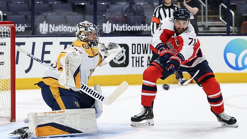 Feb 20, 2021; Columbus, Ohio, USA; Nashville Predators goaltender Pekka Rinne (35) reacts as Columbus Blue Jackets left wing Nick Foligno (71) deflects the puck in the air in the first period at Nationwide Arena. Mandatory Credit: Aaron Doster-USA TODAY Sports