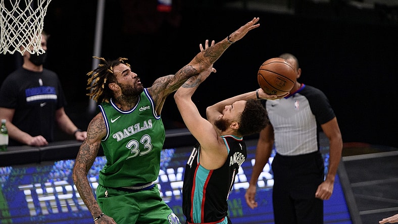 Feb 22, 2021; Dallas, Texas, USA; Dallas Mavericks center Willie Cauley-Stein (33) block a shot by Memphis Grizzlies forward Kyle Anderson (1) during the second quarter at the American Airlines Center. Mandatory Credit: Jerome Miron-USA TODAY Sports