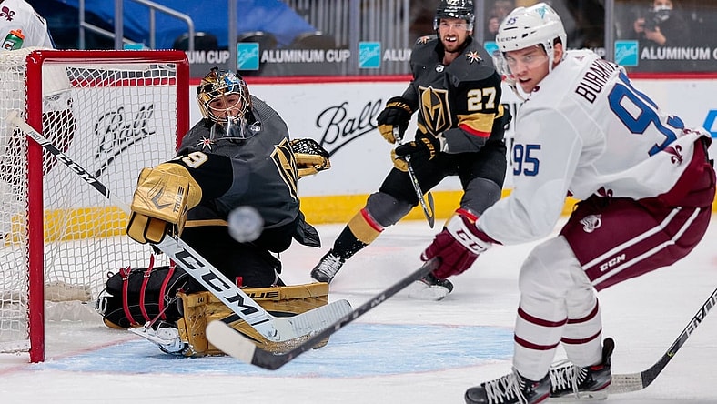 Feb 22, 2021; Denver, Colorado, USA; Vegas Golden Knights goaltender Marc-Andre Fleury (29) and Colorado Avalanche left wing Andre Burakovsky (95) watch as the puck is deflected wide of the net in the first period at Ball Arena. Mandatory Credit: Isaiah J. Downing-USA TODAY Sports