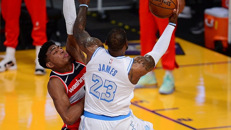 Feb 22, 2021; Los Angeles, California, USA; Los Angeles Lakers forward LeBron James (23) moves to the basket against Washington Wizards forward Rui Hachimura (8) during overtime at Staples Center. Mandatory Credit: Gary A. Vasquez-USA TODAY Sports
