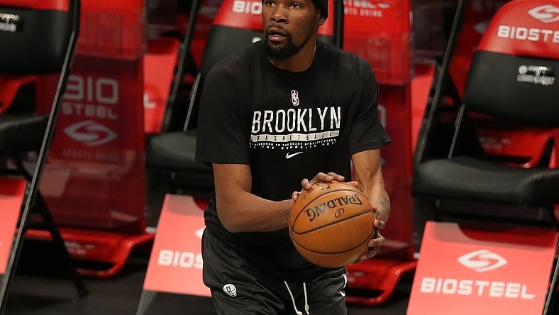 Feb 23, 2021; Brooklyn, New York, USA; Brooklyn Nets power forward Kevin Durant (7) warms up before a game against the Sacramento Kings at Barclays Center. Mandatory Credit: Brad Penner-USA TODAY Sports