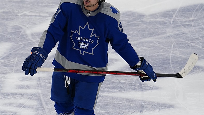 Feb 24, 2021; Toronto, Ontario, CAN; Toronto Maple Leafs forward Auston Matthews (34) heads for the penalty box against the Calgary Flames during the third period at Scotiabank Arena. Mandatory Credit: John E. Sokolowski-USA TODAY Sports