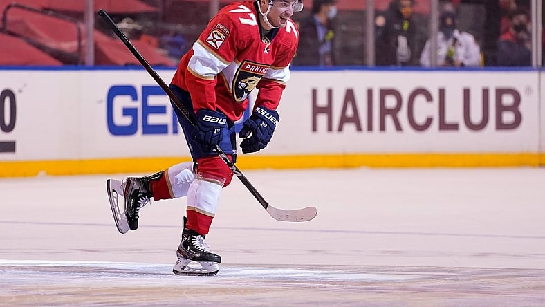 Feb 25, 2021; Sunrise, Florida, USA; Florida Panthers center Frank Vatrano (77) celebrates after scoring a goal against the Dallas Stars during the third period at BB&T Center. Mandatory Credit: Jasen Vinlove-USA TODAY Sports
