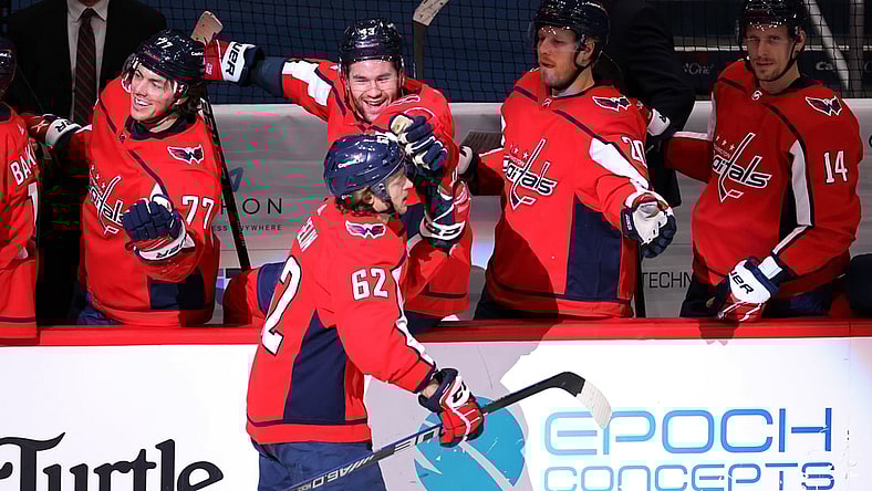 Feb 25, 2021; Washington, District of Columbia, USA; Washington Capitals left wing Carl Hagelin (62) celebrates with teammates after scoring an empty net goal against the Pittsburgh Penguins in the third period at Capital One Arena. Mandatory Credit: Geoff Burke-USA TODAY Sports