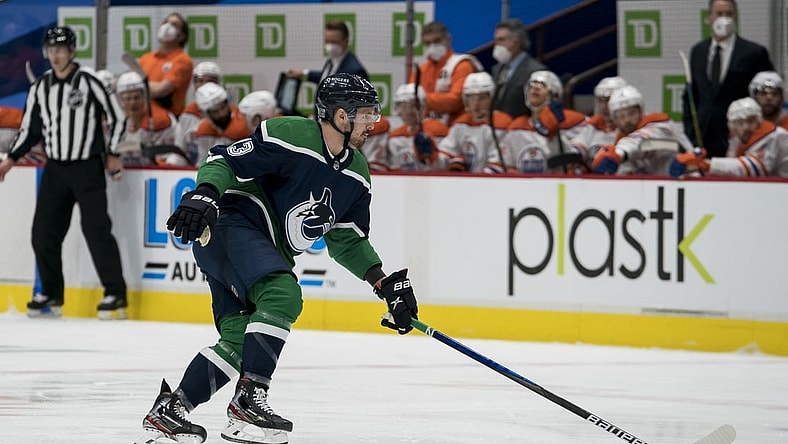 Feb 25, 2021; Vancouver, British Columbia, CAN; Vancouver Canucks forward Jayce Hawryluk  (13) skates against the Edmonton Oilers in the second period at Rogers Arena. Mandatory Credit: Bob Frid-USA TODAY Sports