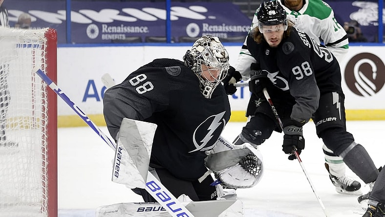 Feb 27, 2021; Tampa, Florida, USA; Tampa Bay Lightning goaltender Andrei Vasilevskiy (88) makes a save against the Dallas Stars during the second period at Amalie Arena. Mandatory Credit: Kim Klement-USA TODAY Sports