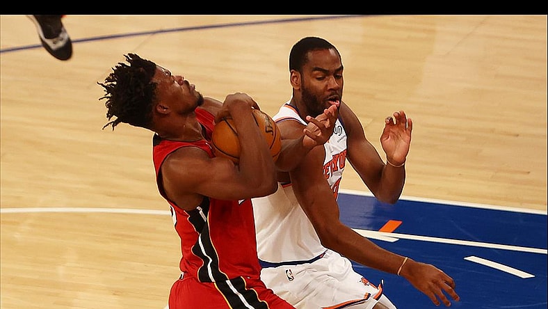 Feb 7, 2021; New York, New York, USA; Austin Rivers #8 of the New York Knicks defends against Jimmy Butler #22 of the Miami Heat at Madison Square Garden on February 07, 2021 in New York City. Mandatory Credit: Mike Stobe/Pool Photo-USA TODAY Sports