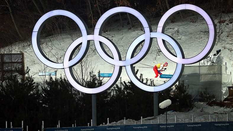 Feb 22, 2018; Pyeongchang, South Korea; Lukas Danek (CZE) skis past the Olympic rings in the nordic combined mens team large hill and 4x5km ski jumping event during the Pyeongchang 2018 Olympic Winter Games at Alpensia Ski Jumping Centre. Mandatory Credit: Rob Schumacher-USA TODAY Sports