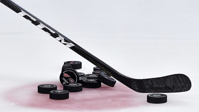 Mar 12, 2019; Montreal, Quebec, CAN; Pucks  and a hockey stick during the warmup period before the game between the Montreal Canadiens and the Detroit Red Wings at the Bell Centre. Mandatory Credit: Eric Bolte-USA TODAY Sports