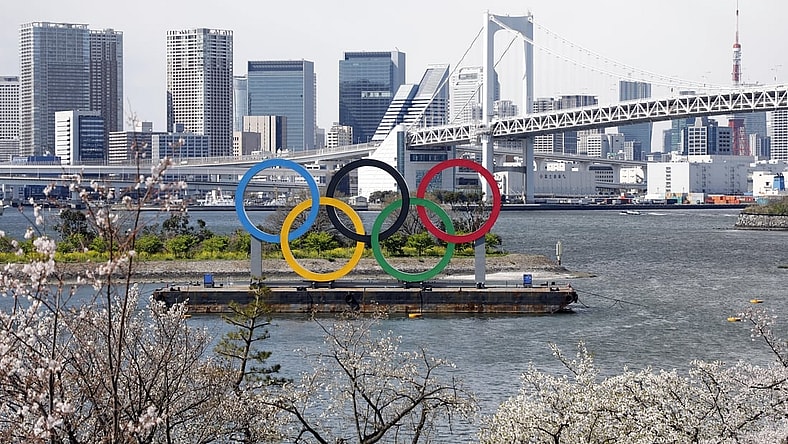 Mar 24, 2020; Tokyo, Japan; Olympic rings monument at Rainbow Bridge, Odaiba, Tokyo. On Monday the IOC announced that the Tokyo 2020 Summer Olympics Games would be postponed due to the COVID-19 coronavirus pandemic. Mandatory Credit: Yukihito Taguchi-USA TODAY Sports