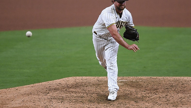 Aug 7, 2020; San Diego, California, USA; San Diego Padres relief pitcher Kirby Yates (39) pitches during the ninth inning against the Arizona Diamondbacks at Petco Park. Mandatory Credit: Orlando Ramirez-USA TODAY Sports