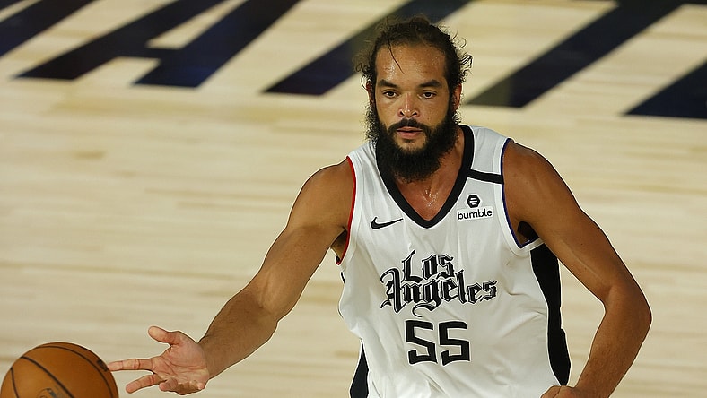 Aug 14, 2020; Lake Buena Vista, Florida, USA; Joakim Noah #55 of the LA Clippers dribbles the ball against the Oklahoma City Thunder during overtime at The Field House at ESPN Wide World of Sports Complex. Mandatory Credit: Mike Ehrmann/Pool Photo-USA TODAY Sports