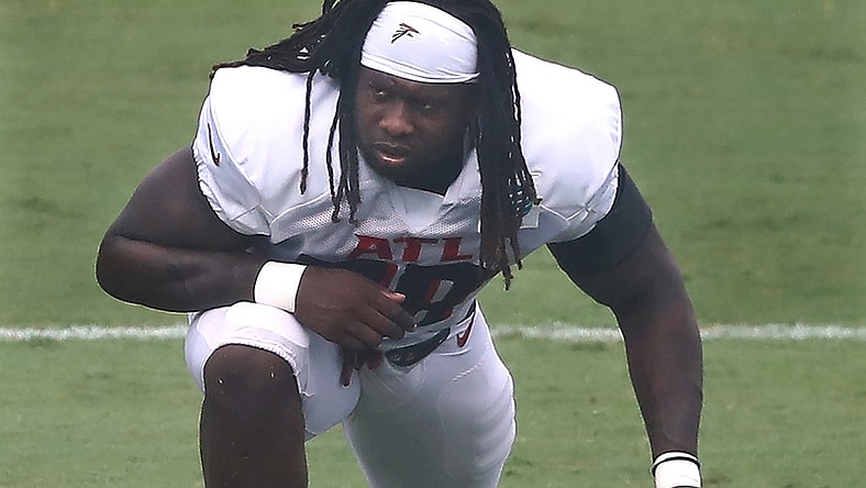 Aug 22, 2020; Flowery Branch, Georgia, USA; Atlanta Falcons defensive end Takk McKinley loosens up during training camp at the Falcons training facility. Mandatory Credit: Curtis Compton/Pool Photo-USA TODAY Sports