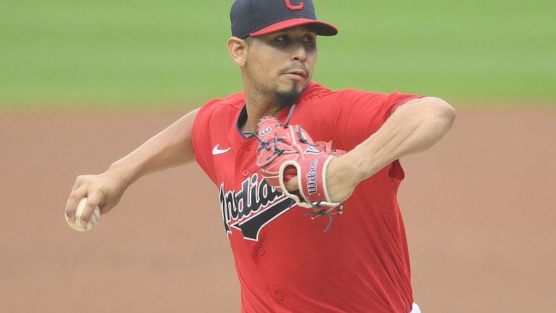 Sep 9, 2020; Cleveland, Ohio, USA; Cleveland Indians starting pitcher Carlos Carrasco (59) delivers in the first inning against the Kansas City Royals at Progressive Field. Mandatory Credit: David Richard-USA TODAY Sports
