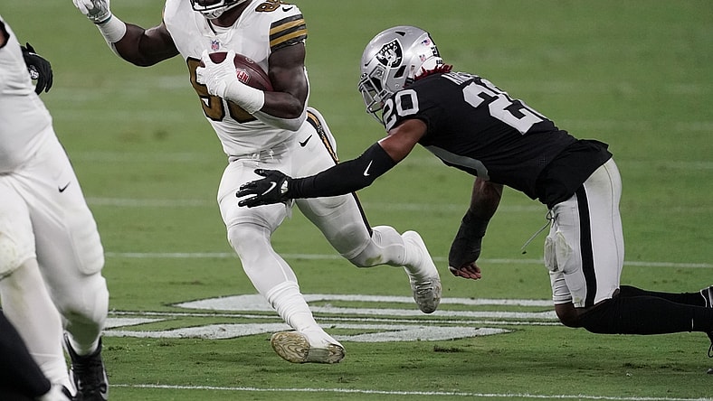 Sep 21, 2020; Paradise, Nevada, USA;  New Orleans Saints running back Ty Montgomery (88) runs the ball against Las Vegas Raiders cornerback Damon Arnette (20) during the third quarter of a NFL game at Allegiant Stadium. Mandatory Credit: Kirby Lee-USA TODAY Sports