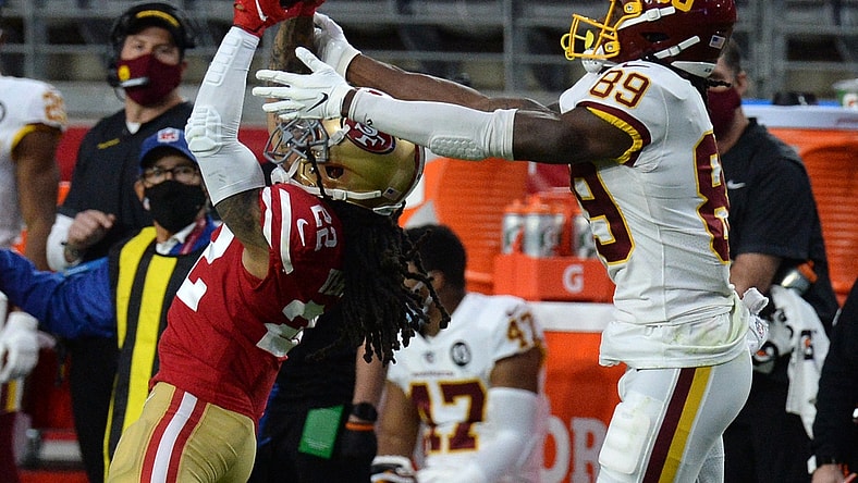 Dec 13, 2020; Glendale, Arizona, USA; San Francisco 49ers cornerback Jason Verrett (22) intercepts a pass intended for Washington Football Team wide receiver Cam Sims (89) during the first half at State Farm Stadium. Mandatory Credit: Joe Camporeale-USA TODAY Sports