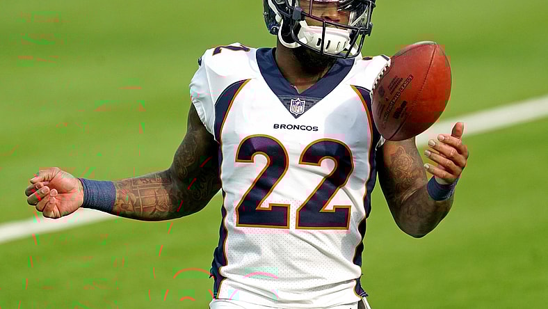 Dec 27, 2020; Inglewood, California, USA; Denver Broncos strong safety Kareem Jackson (22) tosses a football around prior to the game against the Los Angeles Chargers at SoFi Stadium. Mandatory Credit: Kirby Lee-USA TODAY Sports
