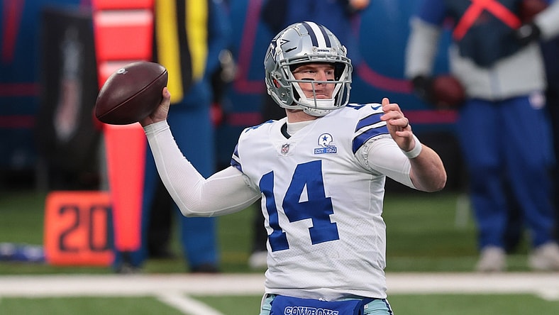 Jan 3, 2021; East Rutherford, NJ, USA; Dallas Cowboys quarterback Andy Dalton (14) throws a pass against the New York Giants in the first half at MetLife Stadium. Mandatory Credit: Vincent Carchietta-USA TODAY Sports