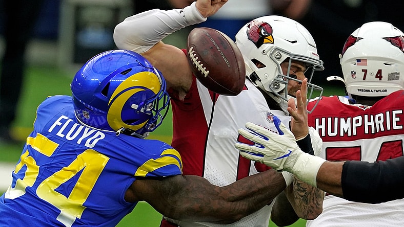 Jan 3, 2021; Inglewood, California, USA; Los Angeles Rams outside linebacker Leonard Floyd (54) applies pressure to Arizona Cardinals quarterback Chris Streveler (15) during the first half at SoFi Stadium. Mandatory Credit: Kirby Lee-USA TODAY Sports