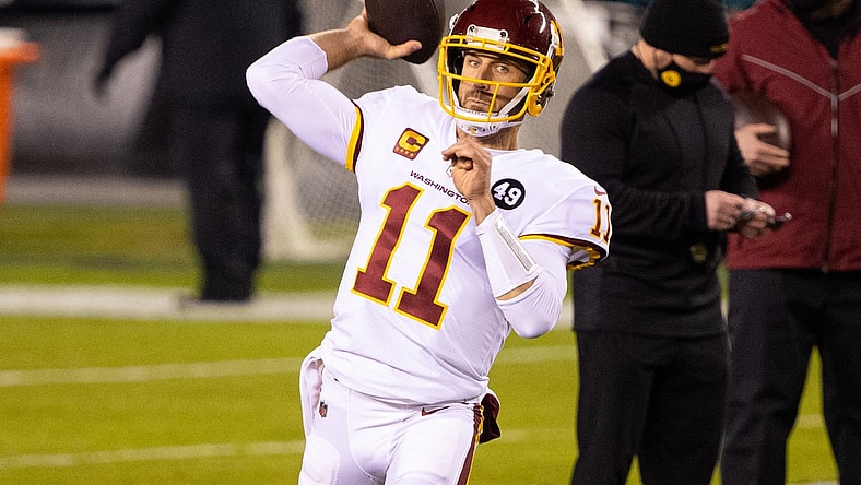 Jan 3, 2021; Philadelphia, Pennsylvania, USA; Washington Football Team quarterback Alex Smith (11) warms up before a game against the Philadelphia Eagles at Lincoln Financial Field. Mandatory Credit: Bill Streicher-USA TODAY Sports