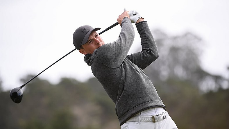 Feb 14, 2021; Pebble Beach, California, USA; Jordan Spieth plays his shot from the third tee during the final round of the AT&T Pebble Beach Pro-Am golf tournament at Pebble Beach Golf Links. Mandatory Credit: Orlando Ramirez-USA TODAY Sports