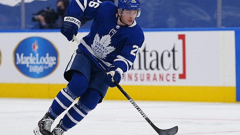 Feb 17, 2021; Toronto, Ontario, CAN; Toronto Maple Leafs forward Jimmy Vesey (26) controls the puck against the Ottawa Senators during the first period at Scotiabank Arena. Mandatory Credit: John E. Sokolowski-USA TODAY Sports