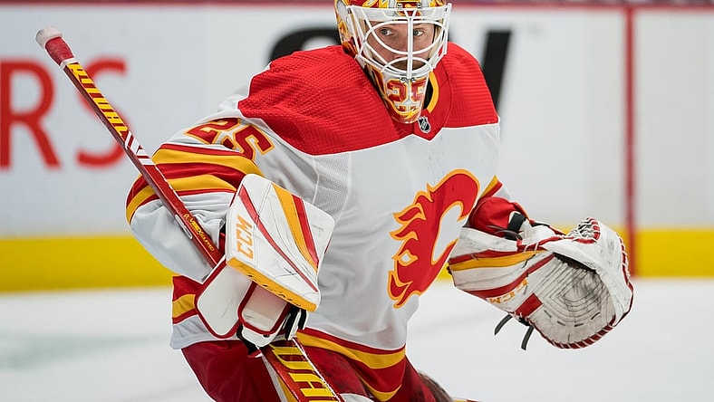 Feb 13, 2021; Vancouver, British Columbia, CAN; Calgary Flames goalie Jacob Markstrom (25) against the Vancouver Canucks in the first period at Rogers Arena. Vancouver won 3-1. Mandatory Credit: Bob Frid-USA TODAY Sports