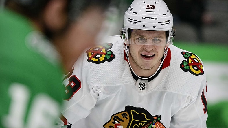 Feb 9, 2021; Dallas, Texas, USA; Chicago Blackhawks center Mattias Janmark (13) in action during the game between the Dallas Stars and the Chicago Blackhawks at the American Airlines Center. Mandatory Credit: Jerome Miron-USA TODAY Sports