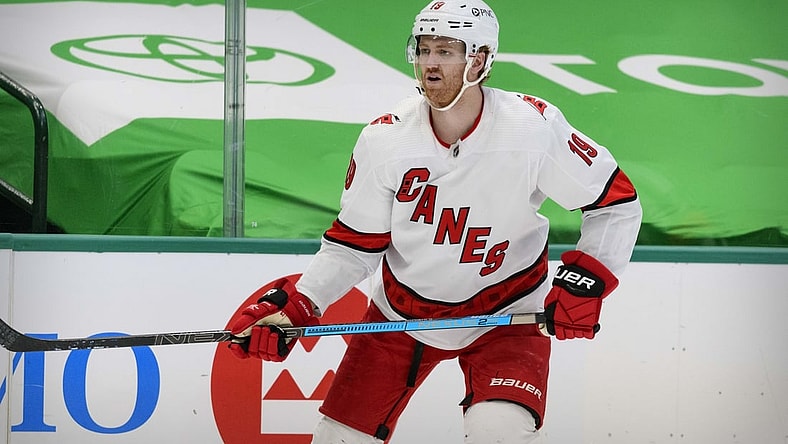 Feb 11, 2021; Dallas, Texas, USA; Carolina Hurricanes defenseman Dougie Hamilton (19) in action during the game between the Dallas Stars and the Carolina Hurricanes at the American Airlines Center. Mandatory Credit: Jerome Miron-USA TODAY Sports