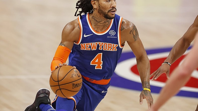 Feb 28, 2021; Detroit, Michigan, USA; New York Knicks guard Derrick Rose (4) dribbles the ball during the first quarter against the Detroit Pistons at Little Caesars Arena. Mandatory Credit: Raj Mehta-USA TODAY Sports