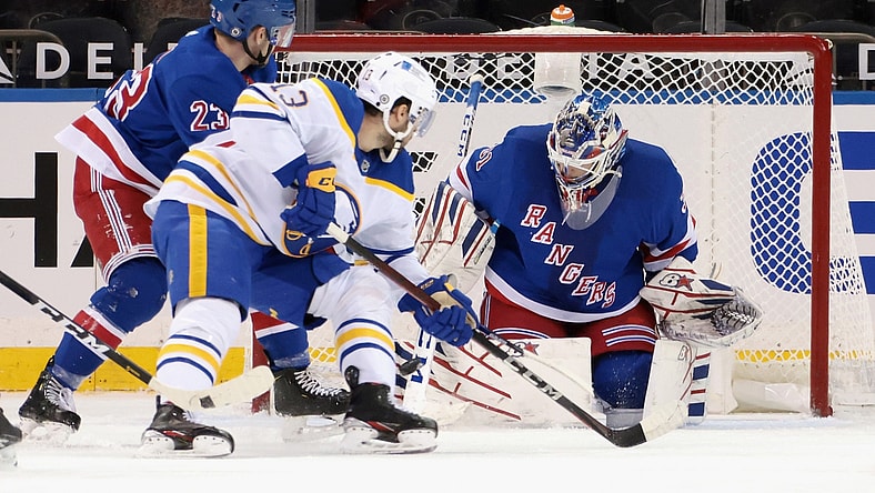 Mar 2, 2021; New York, New York, USA; New York Rangers goaltender Igor Shesterkin (31) blocks the net against Buffalo Sabres center Tobias Rieder (13) during the second period at Madison Square Garden. Mandatory Credit: Bruce Bennett-POOL PHOTOS-USA TODAY Sports