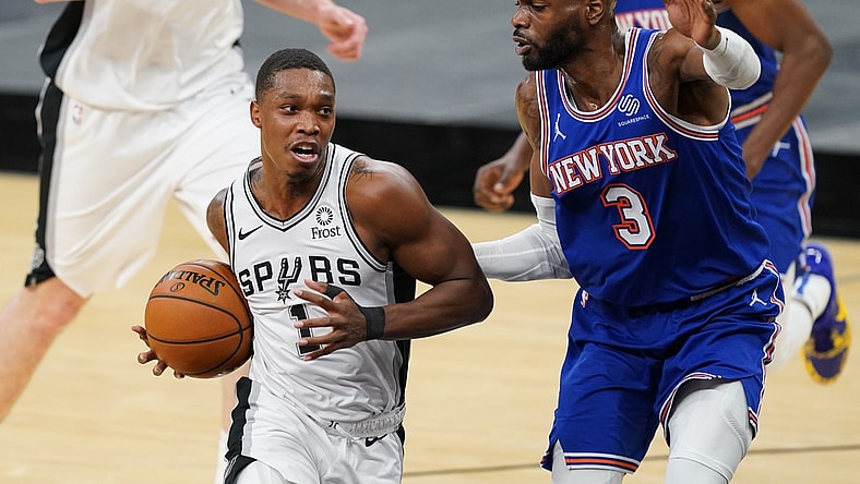 Mar 2, 2021; San Antonio, Texas, USA; San Antonio Spurs guard Lonnie Walker IV (1) dribbles the ball against New York Knicks center Nerlens Noel (3) in the first half at the AT&T Center. Mandatory Credit: Daniel Dunn-USA TODAY Sports
